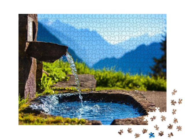 Puzzle 1000 Teile „Alpen: Wasserquelle im Gebirge, Becken, unscharfer Hintergrund“