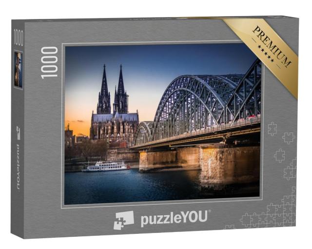 Puzzel 1000 stukjes „UNESCO werelderfgoed: Dom van Keulen, met de Hohenzollern brug op de voorgrond“