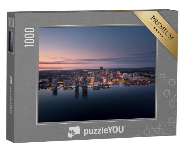 Puzzel 1000 stukjes „Verlicht stadscentrum van Almere bij schemering“