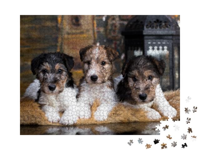 Puzzle 1000 Teile „Niedliche Foxterrier-Welpen auf ihrer kuscheligen Decke“
