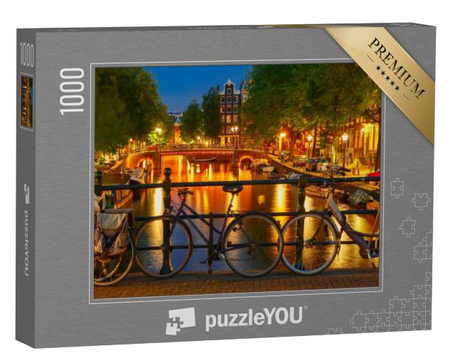 Puzzel 1000 stukjes „Nachtelijke verlichting van de Amsterdamse gracht en brug“