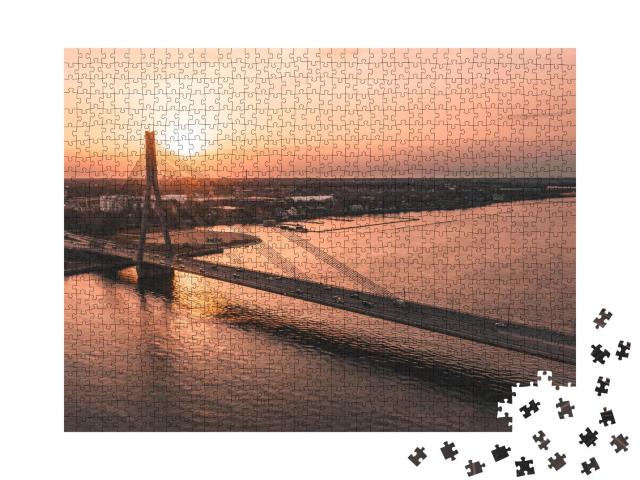Puzzle 1000 Teile „Brücke über den Fluss bei Sonnenuntergang“